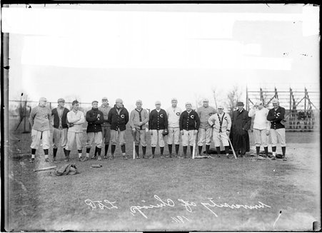 University of Chicago baseball team standing on athletic field, with players on sides of photo looking toward center - Chicago Daily News, Inc.