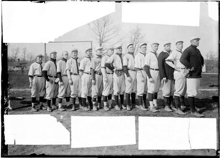 Baseball players, J. T. Thomas, Leslie Sharp, E. Krueger, E. C. Millick, E. Mellick, W. M. Hook, Harry Gleason, coach Bert Kennedy, F. Smith, A. A. Booth, Byron West, Don Prentice, E. M. Stone, W. H. Marbach, and Charles Mather, Lake Forest University baseball team, standing in a line - Chicago Daily News, Inc.