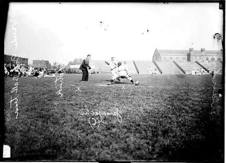 Baseball player sliding into home plate during Waseda University (Japan)-Chicago game - Chicago Daily News, Inc.