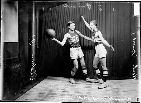 Kimball Park basketball players Alstrom holding the ball and Koch guarding him - Chicago Daily News, Inc.