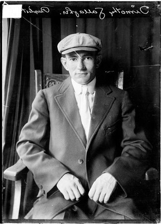 Pugilist, Timothy Gallagher wearing a suit and cap - Chicago Daily News, Inc.