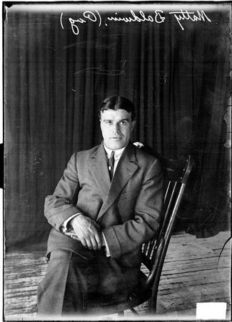 Pugilist, Matty Baldwin sitting in a chair and facing the camera - Chicago Daily News, Inc.