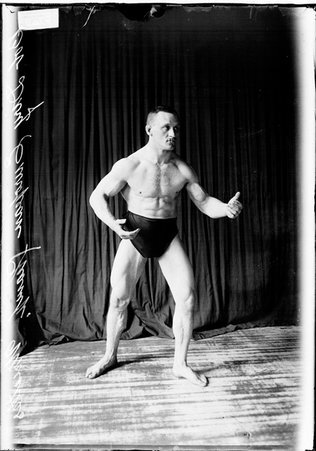Wrestler, Bob Diry, standing in a wrestling stance - Chicago Daily News, Inc.