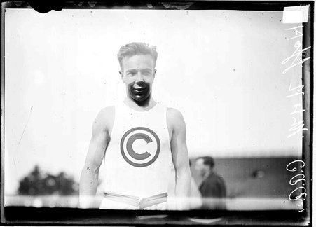 Track athlete, Haff, standing on an athletic field - Chicago Daily News, Inc.