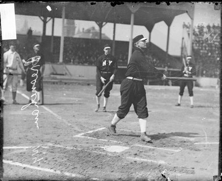 New York National League Superbas baseball player, Roger Bresnahan, batting at West Side Grounds in the Near West Side community area - Chicago Daily News, Inc.