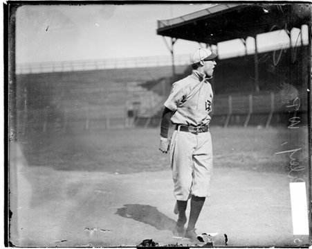 W. P. H. S. baseball player Reiley, standing on home plate on the field at South Side Park, in the Armour Square community area - Chicago Daily News, Inc.