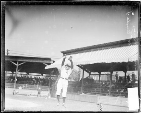 West Ends baseball player, James Heehan, jumping on a field at a baseball stadium - Chicago Daily News, Inc.