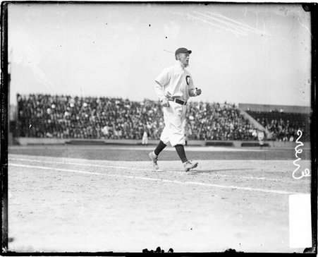 Baseball player Johnny Evers of the National League's Chicago Cubs baseball team, walking down the first baseline - Chicago Daily News, Inc.