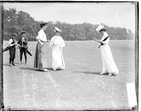 Golfers, Mrs. A. T. H. Brewer, Mrs. J. L. Stack, and Esther Bernard, standing on the grounds of an unidentified golf course - Chicago Daily News, Inc.