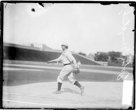 Baseball player John Ganzel of the National League's Cincinnati baseball team, following through after throwing a baseball - Chicago Daily News, Inc.