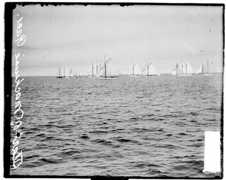 Five lines of yachts sailing in profile on Lake Michigan during the start of the Mackinac Race - Chicago Daily News, Inc.