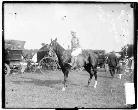 Polo player Rosengarten of the Bryn Mawr polo team, sitting on a horse at Onwentsia Club - Chicago Daily News, Inc.