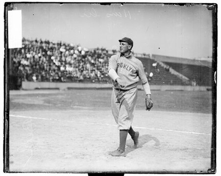 Baseball player Bell, Brooklyn Superbas, following through after throwing a baseball at West Side Grounds - Chicago Daily News, Inc.