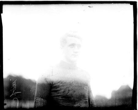 University of Chicago football player Hewitt standing outdoors - Chicago Daily News, Inc.