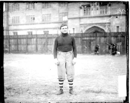 University of Chicago football player Bezdek standing on an athletic field - Chicago Daily News, Inc.