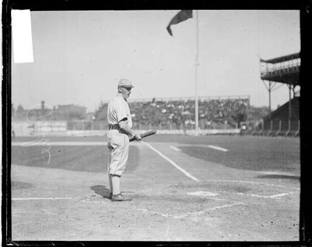 Baseball player George Rohe, Chicago White Sox, holding a baseball bat, standing in the batter's box - Chicago Daily News, Inc.