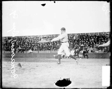 Baseball player Frank Donovan of the Logan Sqaure semiprofessional baseball team, swinging a baseball bat - Chicago Daily News, Inc.