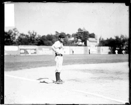 Baseball player Al Hage of the West End baseball team, standing at third base - Chicago Daily News, Inc.