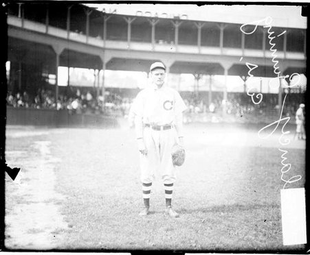 Baseball player Delancy Gunning, Chicago Cubs, standing on the field at West Side Grounds - Chicago Daily News, Inc.