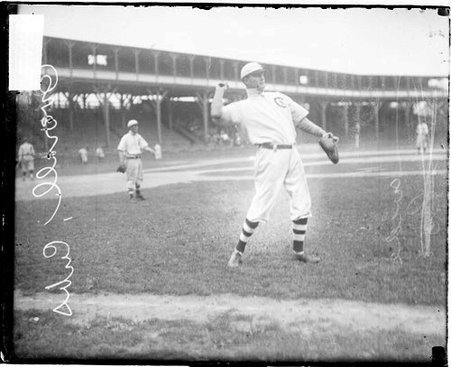 Baseball player O. Overall, Chicago Cubs, cocking his arm to throw a baseball - Chicago Daily News, Inc.