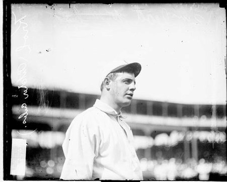 Baseball player Kroh, Chicago Cubs, standing on the field at West Side Grounds - Chicago Daily News, Inc.