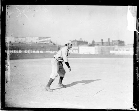 Baseball player Harry Lord, Boston, standing in profile in a ready position near third base - Chicago Daily News, Inc.