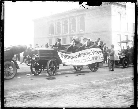 Group of unidentified men sitting in an Illinois Athletic Club automobile parked along a curb - Chicago Daily News, Inc.