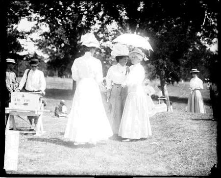 Golfers Mrs. R. H. Donnelley, Mrs. C. W. Buckley, and an unidentified woman standing on a tee - Chicago Daily News, Inc.