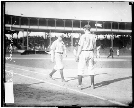 Baseball player Del Howard, Chicago Cubs, walking on the first baseline near first base - Chicago Daily News, Inc.