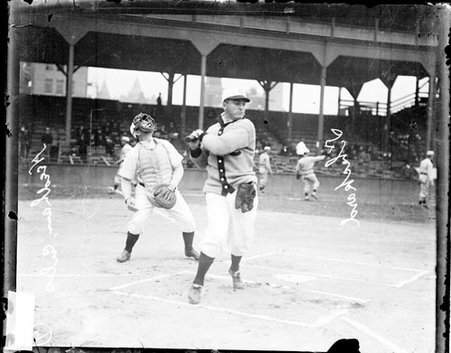 Baseball player J. T. Sheckard, Chicago Cubs, following through after swinging a baseball bat - Chicago Daily News, Inc.