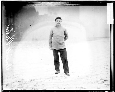Runner Dorando Pietri standing on the lakefront - Chicago Daily News, Inc.
