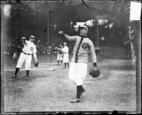 Baseball player Pat Moran, Chicago Cubs, following through after throwing a baseball - Chicago Daily News, Inc.