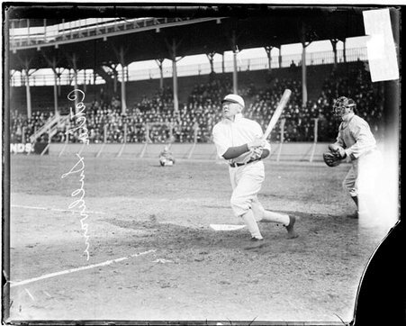 Baseball player Sullivan, catcher, Chicago White Sox, looking down the third baseline after hitting a baseball - Chicago Daily News, Inc.