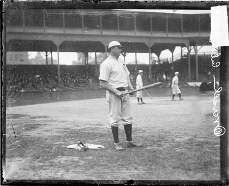 Pitcher O. Overall, Chicago Cubs, holding a baseball bat, standing in foul territory - Chicago Daily News, Inc.