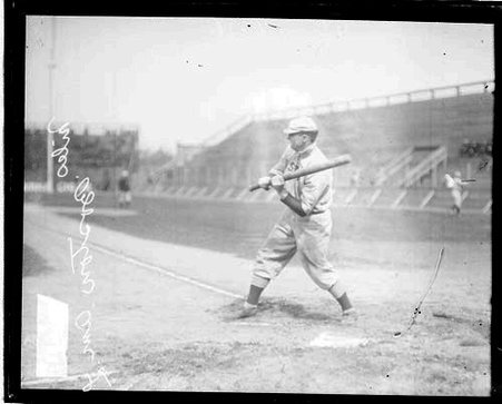 Baseball player Niles, Boston, holding a baseball bat - Chicago Daily News, Inc.
