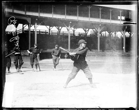 Baseball player Roth, Cincinnati, holding a baseball bat, standing in a batting stance - Chicago Daily News, Inc.