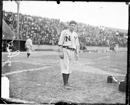 Baseball player Doyle, New York, standing on the field at West Side Grounds - Chicago Daily News, Inc.