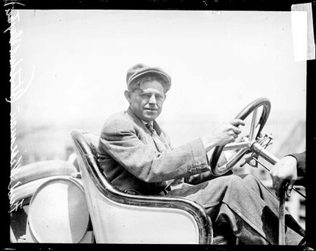 Automobile driver Fred Wiseman looking at the camera, sitting in the driver's seat of a Stoddard-Dayton automobile during the Cobe Cup Race - Chicago Daily News, Inc.
