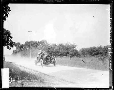 Automobile driver M. J. Seymour driving an Apperson automobile during the Cobe Cup Race - Chicago Daily News, Inc.