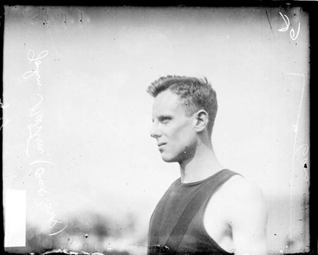 Oak Park athlete John Martin standing outdoors - Chicago Daily News, Inc.