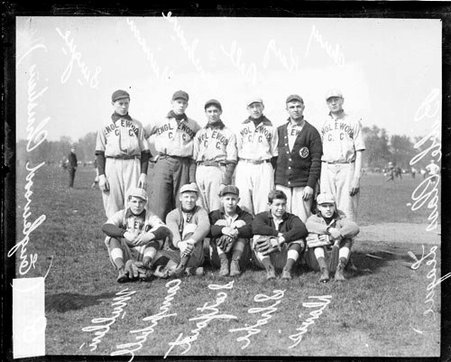 Members of the Bible Class League's Englewood Christian baseball team posing on a grass field - Chicago Daily News, Inc.