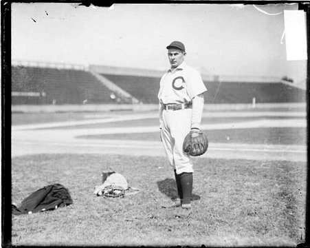 Baseball player Kahoe, Washington, standing in foul territory on the field at South Side Park - Chicago Daily News, Inc.