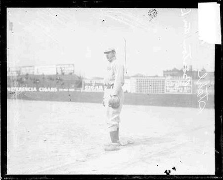 Baseball player Stahl, Boston, standing at first base on the field at South Side Park - Chicago Daily News, Inc.