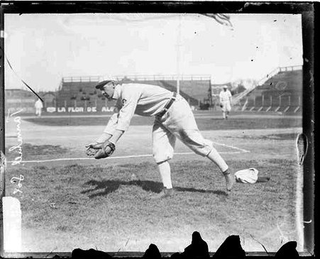 Baseball player Lee Tannehill, Chicago White Sox, leaning forward with his hands in front of him - Chicago Daily News, Inc.