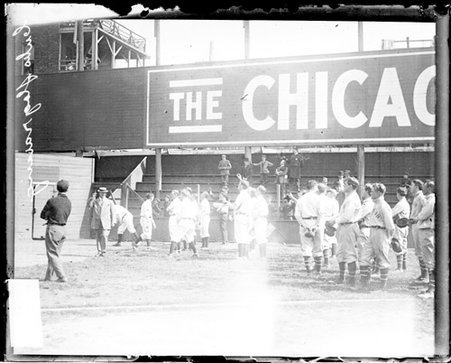 Members of Chicago Cubs baseball team standing in the outfield during a pennant-raising ceremony at West Side Grounds - Chicago Daily News, Inc.