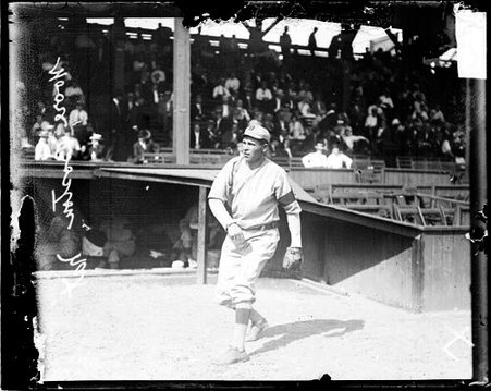Baseball player Moore, Boston, following through after throwing a baseball at West Side Grounds - Chicago Daily News, Inc.