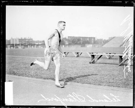 Leland Stanford athlete R. S. Worthington running on the track at Marshall Field - Chicago Daily News, Inc.