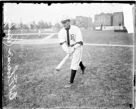 Baseball player Ed Flavin, Donahue's Red Sox, holding a baseball bat - Chicago Daily News, Inc.
