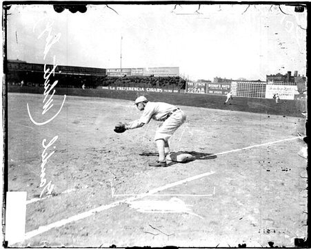 Baseball player Chick Gandil, Chicago White Sox, leaning forward in a fielding position at South Side Park - Chicago Daily News, Inc.