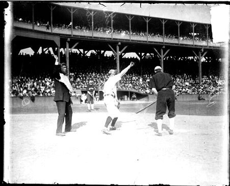Catcher James P. Archer, Chicago Cubs, standing behind home plate at West Side Grounds - Chicago Daily News, Inc.
